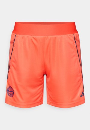 Bright orange athletic shorts with a smooth texture, an elastic waistband, side pockets, and navy accents. Features FC Bayern Munich logo.
