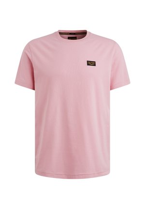 T-shirt rosa chiaro a maniche corte in cotone, con scollatura rotonda e un piccolo etichetta nera sul petto con del testo.