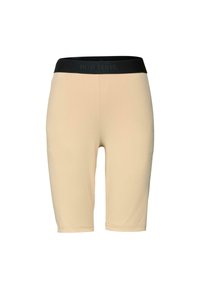 Béžové cyklistické kraťasy s čiernym elastickým pásom. Vyrobené z elastického materiálu, s hladkým povrchom a dĺžkou do polovice stehna.