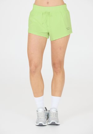 Ljusgröna sportshorts med elastisk midja, dragsko och subtila sidoperforeringar för andningsförmåga.