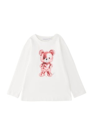 Camicia bianca a maniche lunghe con la stampa centrale di un palloncino a forma di orsacchiotto rosa brillante che tiene un cuore.