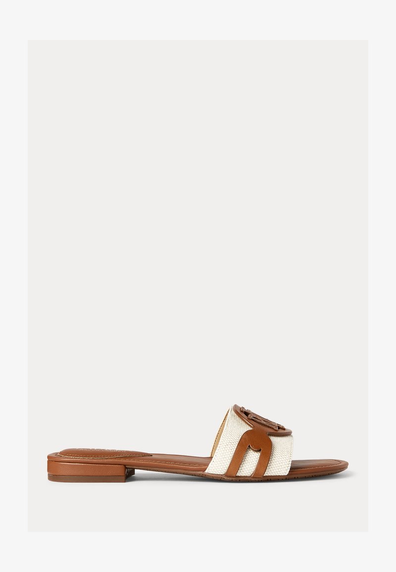 Brown and cream flat sandals featuring a woven upper, tan leather accents, and a geometric decorative detail on the front strap.