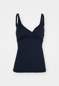 Marineblå tanktop med tynne justerbare stropper, V-hals design og innpakket front. Glatt, elastisk stoff uten synlige mønstre.
