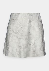 Jupe gris clair à motif avec une finition douce et texturée. Elle présente une forme évasée et une ceinture nette sans quincaillerie visible.