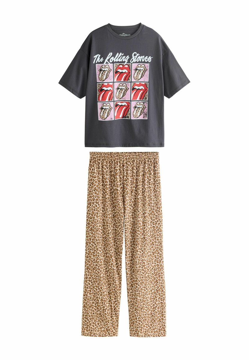 Tumehallisulgeva graafiline T-särk, millel on The Rolling Stones'i logo; kombineeritud beeži leopardimustriga pidžaamapükstega, millel on elastne vöökoht.