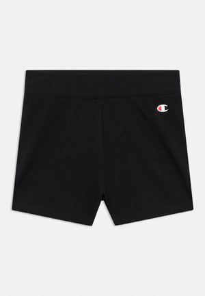 Μαύρα αθλητικά σορτς από λείο, ελαστικό ύφασμα. Διαθέτουν ελαστική μέση και μικρό λογότυπο Champion σε κόκκινο και λευκό.