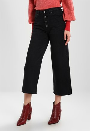 Vaqueros a campana - black