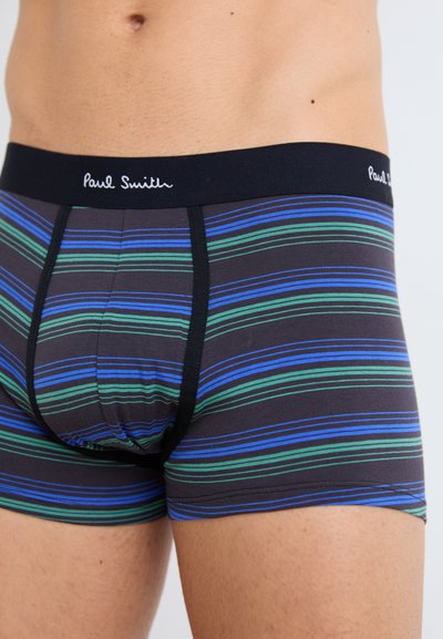 Pánske boxerky v čiernej farbe s horizontálnymi pruhmi v modrej a zelenej farbe. Elastický pás so logo "Paul Smith". Mäkká textúra látky.