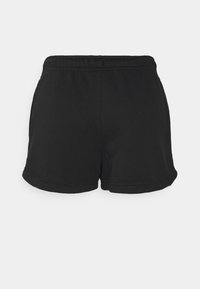 Black cotton shorts with a soft, smooth texture. Features an elastic waistband and rolled hem. Simple, functional design without pockets.