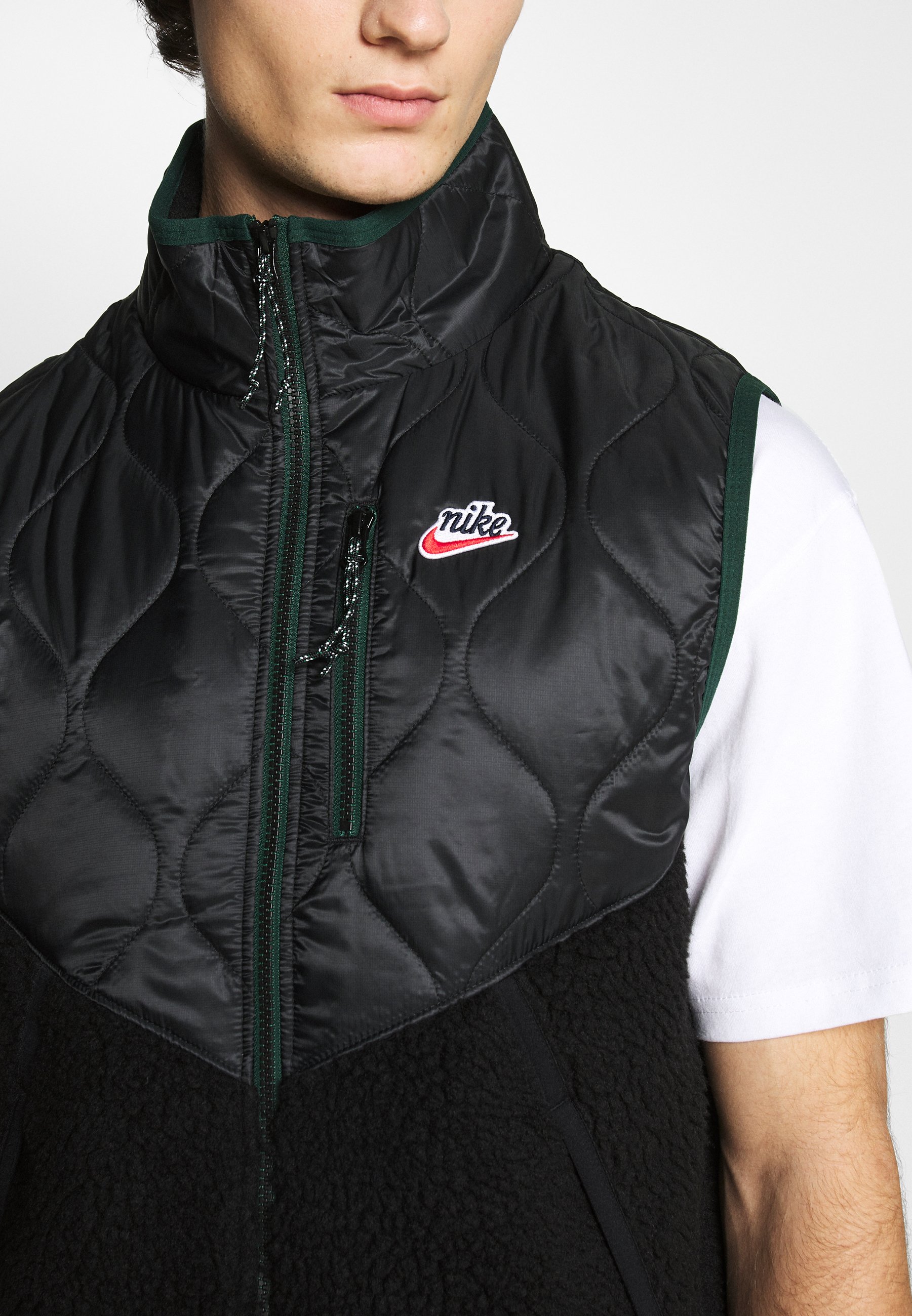 green nike body warmer