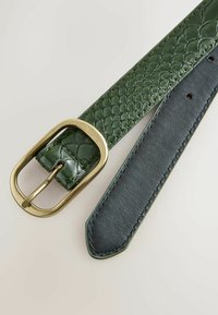 Green embossed leather belt with a gold-tone rectangular buckle; smooth black leather reverse side; pointed tip and stitching details.