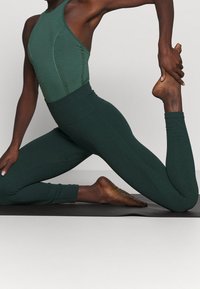 Nike Performance Justaucorps - dark green