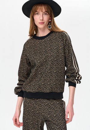 Sweatshirt met luipaardprint en zwarte geribbelde manchetten en zoom, met beige en bruine strepen langs de mouwen. Zachte, gestructureerde stof.