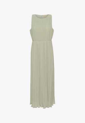 Bez piedurknēm, gaiši zaļa maksi kleita ar vertikālām krokām, apaļu kakla izgriezumu un slēptu aizmugurējo rāvējslēdzēju. Izgatavota no mīkstas, plūstošas auduma.