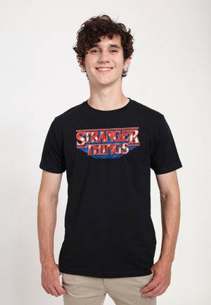 STRANGER THINGS RETRO LOGO - T-shirts print - black