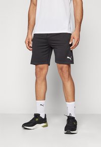 Puma FORM SEAMLESS 7 - Športové šortky - black/white cat