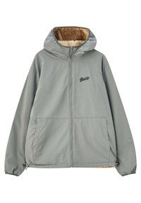 Veste zippée gris clair avec capuche, doublure en polaire marron douce, poignets élastiques et deux poches avant. Logo affiché sur la poitrine.