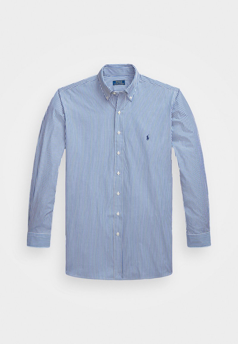 Blå och vit randig långärmad skjorta med krage och liten broderad logotyp på bröstet. Tyget verkar slätt och lätt.