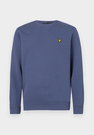 Modrá mikina so zaobleným výstrihom, dlhými rukávmi, rebrovanými manžetami a malým žltým logom na ľavej hrudi. Mäkký bavlnený materiál.