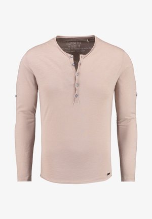 Beige Langarm-Henley-Shirt aus weichem Stoff, mit einer Knopfleiste und dekorativer Naht entlang des Ausschnitts und der Bündchen.