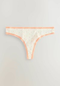 String crema con piccolo motivo a cuore arancione, accentuato da rifiniture pesca e una cintura elastica. Tessuto morbido con una texture liscia.
