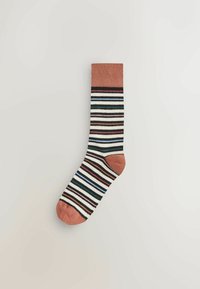 Raštuotos kojinės su rūdžių spalvos manžetė ir padu, su raštais juodos, baltos, rožinės ir mėlynos spalvų. Pagamintos iš tekstūruotos medžiagos.