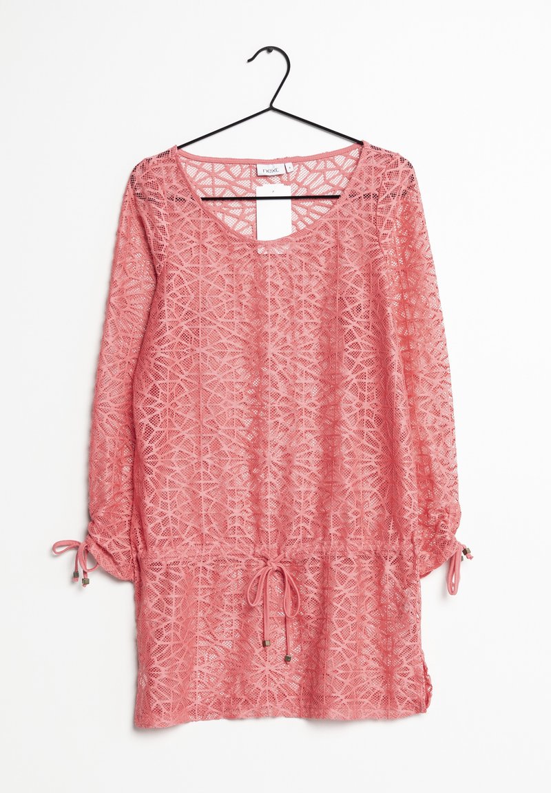Kanten tuniek in koraalroze, met geometrische patronen, lange mouwen met trekkoorden en een ronde halslijn.
