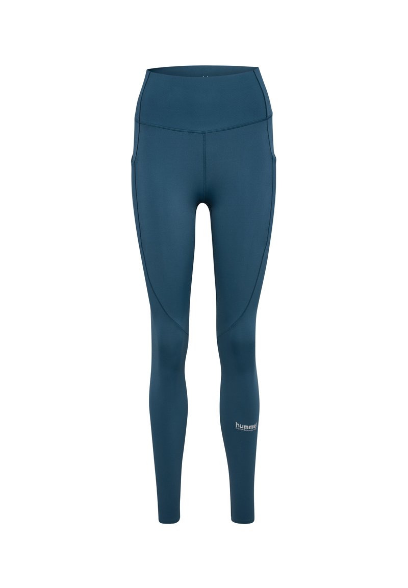 Teal högmidjade leggings gjorda av stretchigt, slätt tyg. Har sidofickor och en logo nära vristen. Formsydd design.