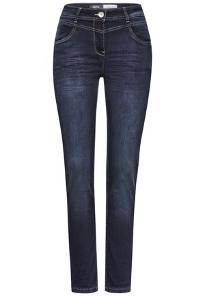 Jeans en denim bleu foncé avec une coupe slim, dotés de coutures contrastantes, de cinq poches et d'une fermeture à bouton au niveau de la taille.