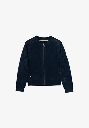 Veste bomber bleu marine avec un éclat métallique, corps en tricot et manches en tissage ouvert. Comprend une fermeture éclair à l'avant et un col rond. Quincaillerie en accent argenté.