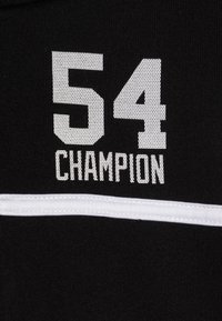 Must mustr fabric, mille valge tekst: "54" suure arvu fondis ja "CHAMPION" väiksemas tekstis, eraldatud valge triibuga.