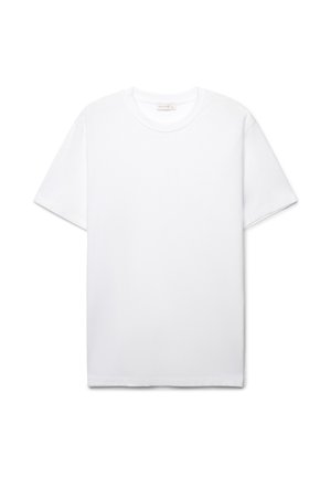 T-shirt bianca semplice a maniche corte con scollo tondo, vestibilità comoda, mostrata distesa su uno sfondo bianco.