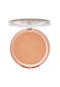 Bronzer compact présentant une poudre ronde aux tons pêche, nichée dans un boîtier transparent, avec une texture lisse et un éclat subtil.