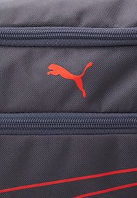 Puma FUNDAMENTALS BAG XS UNISEX - Športna torba - galactic gray