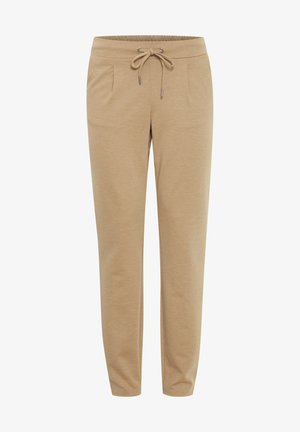 Beige Jogginghosen aus weichem Stoff, mit einem elastischen Bund und Kordelzug, seitlichen Taschen und einem schmalen Bein-Design.