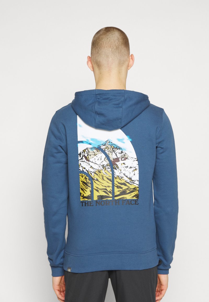 The North Face SEASONAL GRAPHIC HOODIE - Sweatshirt - shady blue/dark blue  - Zalando.co.uk