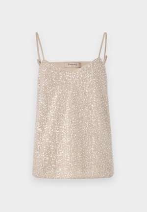 Beżowy top na cienkich ramiączkach z cekinami, z dekoltem w kształcie litery V i miękką, gładką fakturą. Metka z napisem "TWINSET."