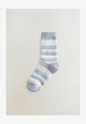 Proužkované ponožky s motivy v světle modré, šedé a jemně růžové barvě. Vyrobeny z chlupatého materiálu s žebrovaným lemem a zaobleným designem špičky.