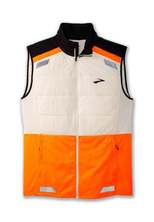 Gevoerde mouwloze vest in wit en feloranje, met zwarte accenten. Voorzien van reflecterende details en een rits aan de voorkant voor sluiting.