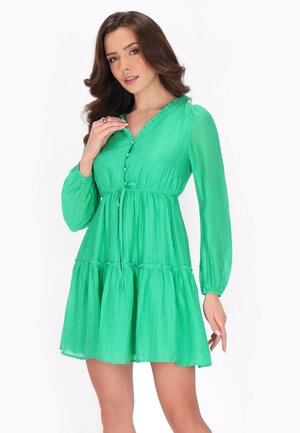 Groen, lichtgewicht jurk met lange, pofmouwen, een ruches decolleté en een getailleerde taille. Bevat een gelaagde rok en knoopdetails.