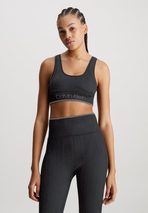 Calvin Klein Performance MEDIUM IMPACT - Sport-BH mit starker Stützkraft - black beauty