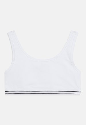 Biały bawełniany crop top z ramiączkami o szerokim kroju, gładką fakturą oraz czarnym paskiem akcentującym wzdłuż dolnej krawędzi.