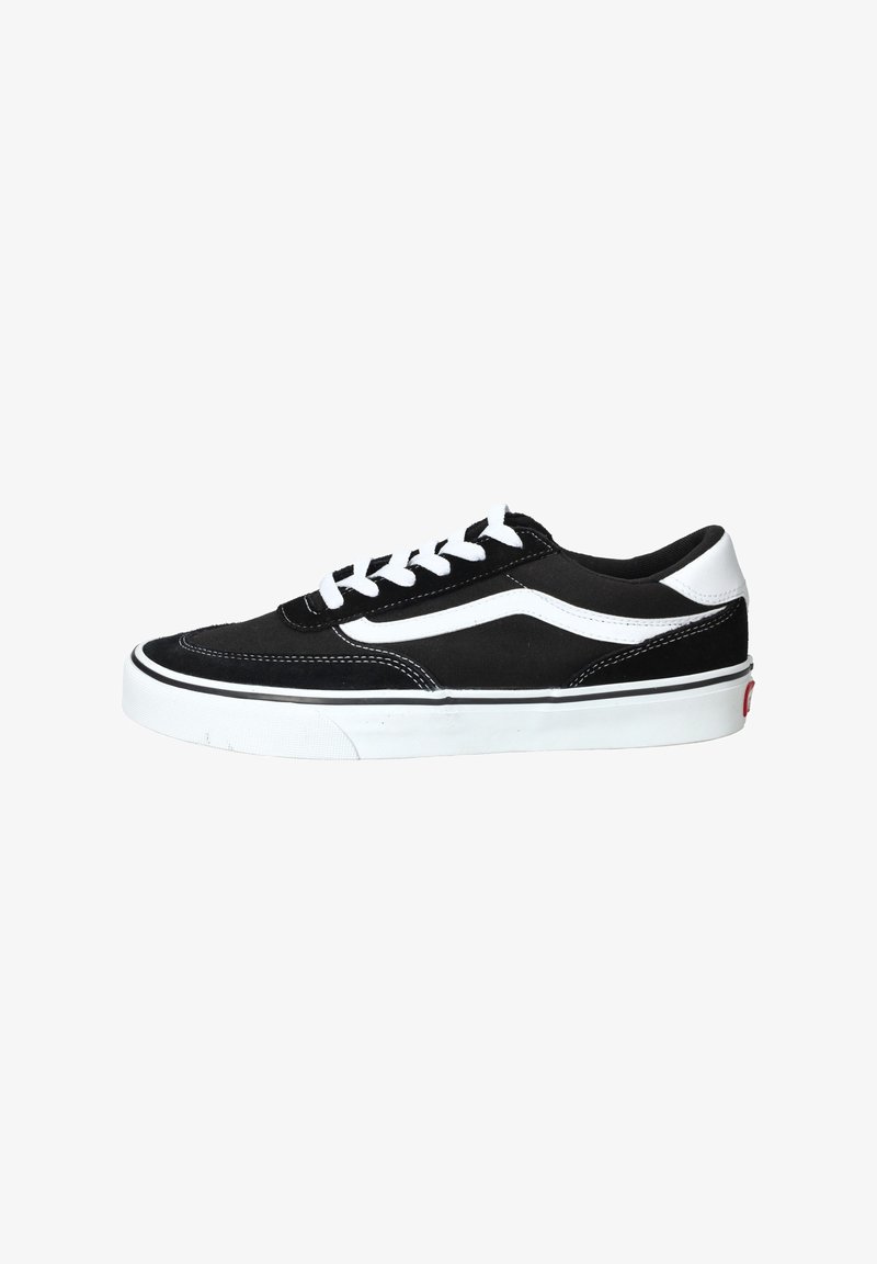 Sneaker nera in tela con lacci bianchi, striscia bianca decorativa e suola in gomma. Presenta dettagli di cucitura e un design classico a bassa punta.