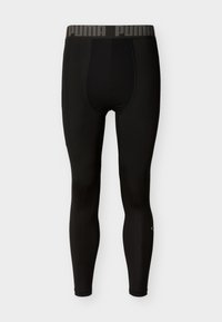 Ανδρικά αθλητικά κολάν συμπίεσης σε μαύρο χρώμα με ελαστική μέση με λογότυπο και πάνελ με ραφές, εμφανιζόμενα από μπροστινή όψη σε απλό φόντο.