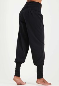 Urban Goddess DEVI YOGA - Tygbyxor - urban black