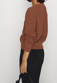 Minimum Sweter