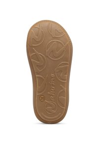 Semelle en caoutchouc d'une chaussure d'enfant de taille 20, présentant des motifs circulaires et courbés en relief ainsi que le nom de la marque "Naturino."