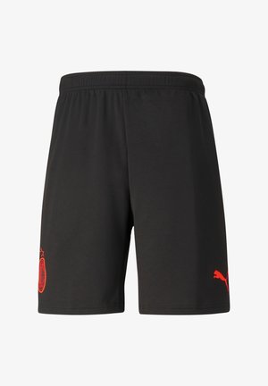 Sorte atletikshorts med elastisk taljebånd, der har et rødt klublogo og et rødt Puma-logo på venstre side. Glat tekstur, standard pasform.
