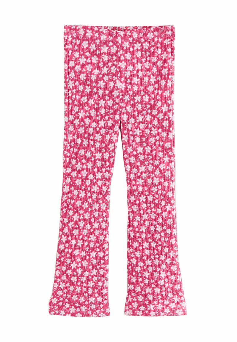 Rosa ausgestellte Hosen aus geripptem Stoff mit verstreuten weißen Blumenmustern. Elastischer Bund, weiche Textur und mittelhoher Schnitt.