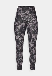 Højtaljede leggings i et sort og gråt abstrakt mønster med en glat, strækbar tekstur. Har et lille logo på den nederste del af benet.